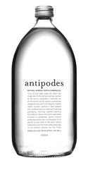Case of 12 Antipodes sparkling water bottles, 1L each, showing elegant glass bottles with natural mineral water for hydration