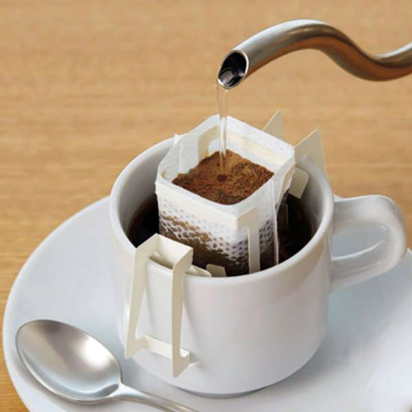 Colombian Elias & Shady Bayter premium pour over coffee sachets in packaging, featuring single serve specialty filter bags