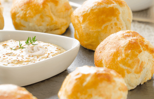 Mini Wellingtons ready to cook, perfectly portioned beef pastries prepared for simple home baking, shown on a white plate