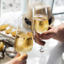 Bottle of OSAN Bulles TM Marigold Mirabelle, an alcohol-free sparkling beverage with golden hues, 750ml bottle