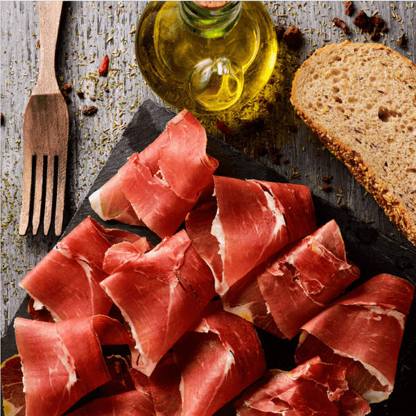 Serrano dry ham Gran Reserva aged 16 months in thin premium slices, gourmet Spanish cured meat for non-Muslims