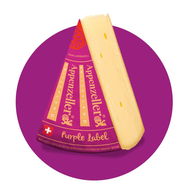 Appenzeller purple label cheese, a spicy and aromatic Swiss cheese wheel slice of 250g weight, with deep golden rind