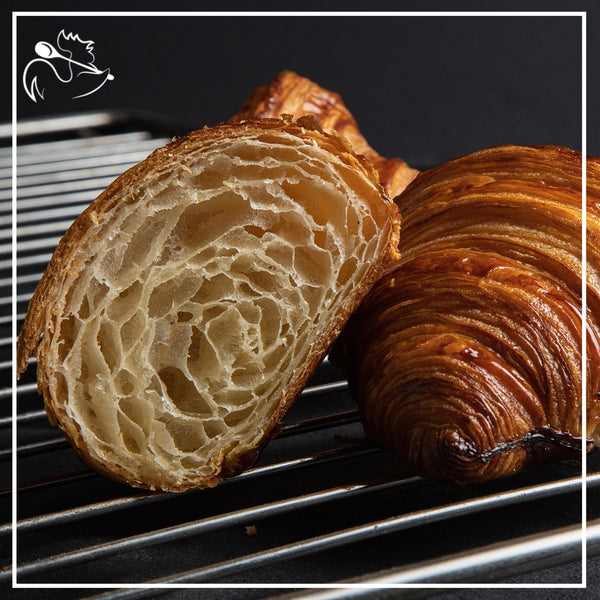 Delicious artisan croissants, two golden-brown pastries with flaky layers, perfect for breakfast or brunch, 2 pieces of 90g each