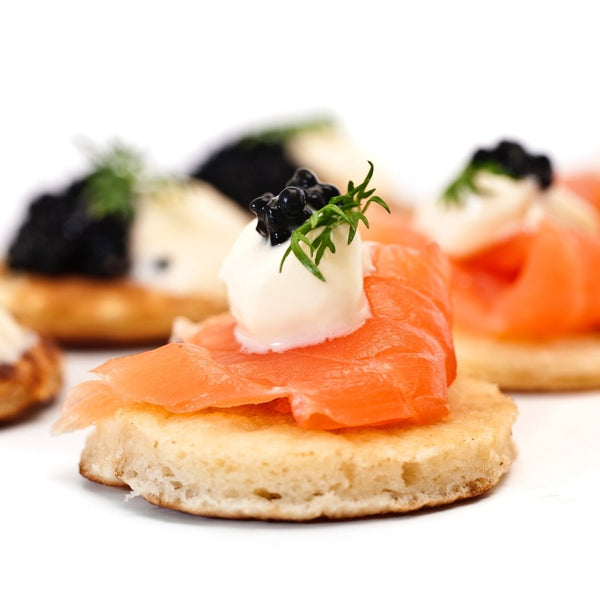 Mini blinis 16 pieces frozen for appetizers, perfect for serving with cream cheese and smoked salmon at parties