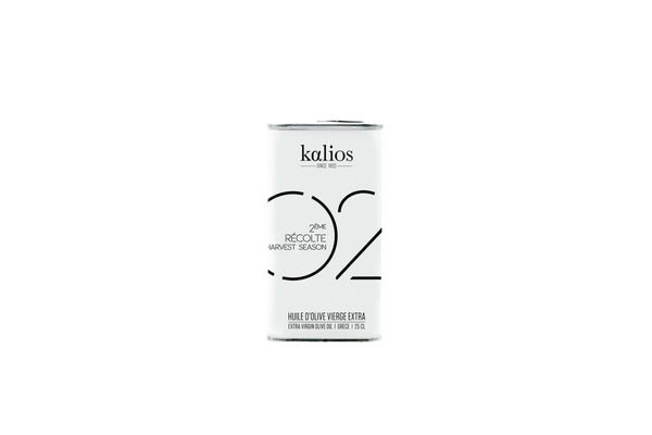 Extra virgin olive oil in a 250ml dark glass bottle with minimalist label, traditional cold-pressed quality