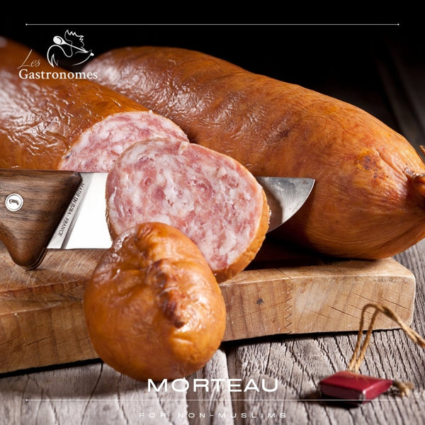 Delicious Morteau sausages from France, 2 smoked pork sausages displayed on wooden surface, traditional meat product for non-muslim