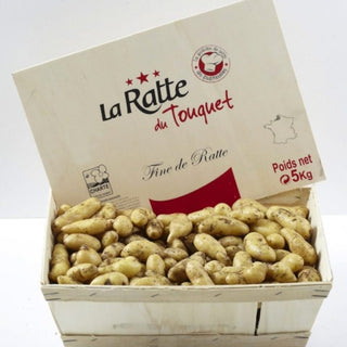 Fresh Ratte du Touquet potatoes in 500g package, showing high-quality small elongated yellow potatoes ready for cooking