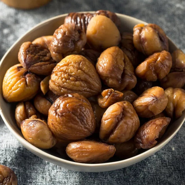 Whole cooked chestnuts in a sealed 400g package ready to eat, displayed on a simple white background