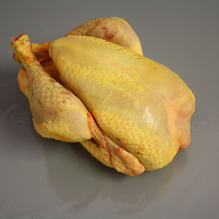 Fresh yellow chicken from France, whole and frozen, ready to cook, high-quality poultry for gourmet meals