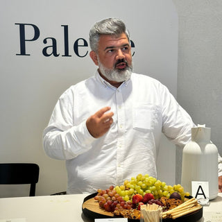 Flavors interactive tasting event with guests enjoying diverse culinary samples served at a beautifully arranged table