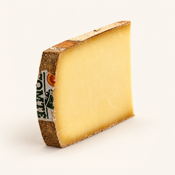 Comté 18 months 200g cheese wedge, illustrative studio image