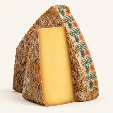 Comté 30 Months aged cheese wedge, illustrative studio image