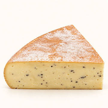 Raclette à la truffe wedge with black truffle flecks, illustrative product image
