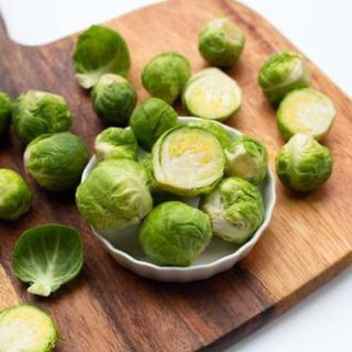 Fresh organic brussel sprouts 500g package, bright green vegetables ready for healthy cooking and meals