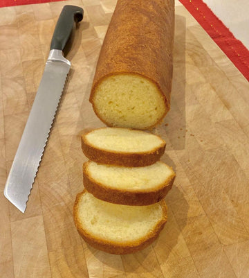 Artisan pain brioche bread with crispy golden crust, sliced and ready to serve with foie gras, 300g loaf