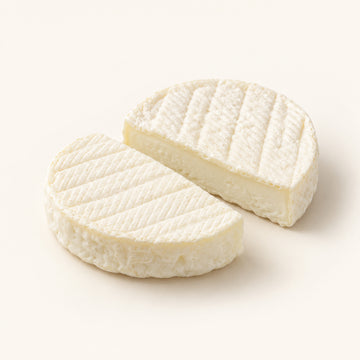 Rocamadour 35g farmhouse goat cheese cut into two halves