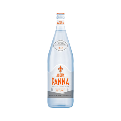 Bottle of Acqua Panna natural mineral water in elegant glass packaging, 1 liter size, premium still water from Italy