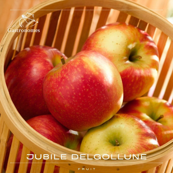 Fresh ripe apple Jubile Delgolune variety on white background, perfect for healthy eating and cooking