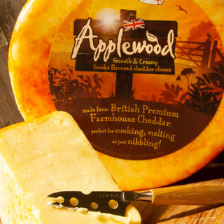 Applewood smoked cheese with a rich orange rind, creamy texture and distinctive smoky flavor, perfect for melting