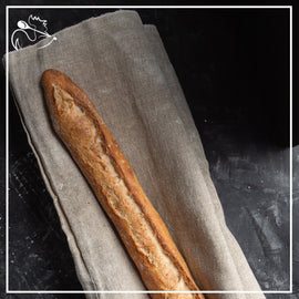 Fresh artisan French baguette tradition with crispy golden crust, handcrafted by bakers using traditional methods