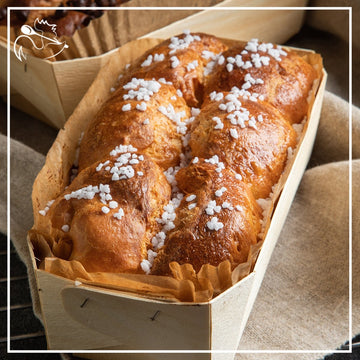 Brioche bread loaf with sugar crust, golden brown artisanal 500g pastry for breakfast or dessert, fresh bakery product
