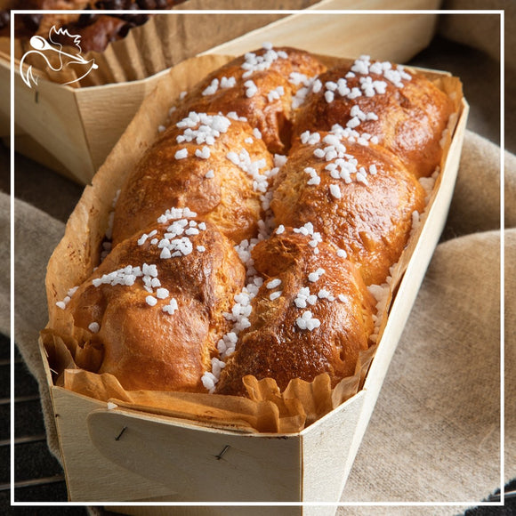 Brioche bread loaf with sugar crust, golden brown artisanal 500g pastry for breakfast or dessert, fresh bakery product