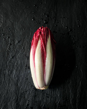 Chicory red endive, fresh organic vegetable with vibrant purple-red leaves, ready to enhance your salads or dishes, 300g pack.