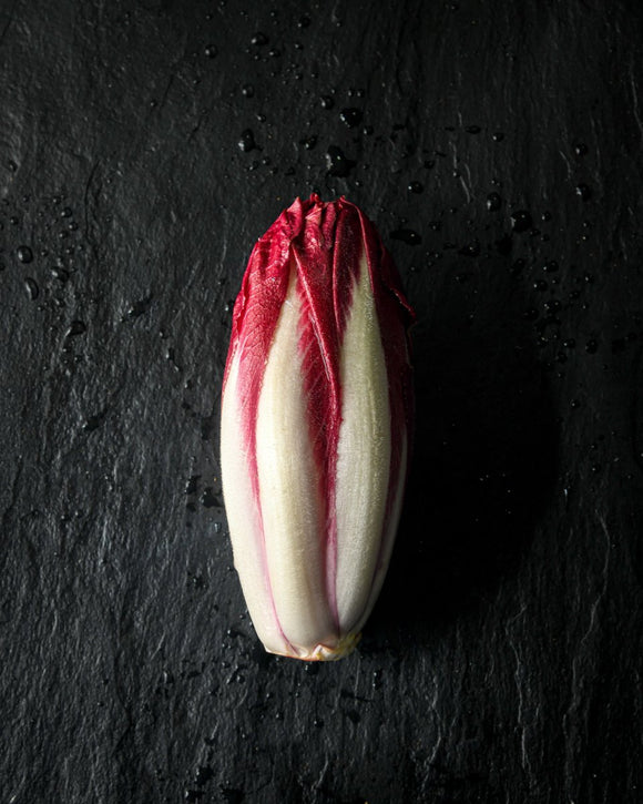 Chicory red endive, fresh organic vegetable with vibrant purple-red leaves, ready to enhance your salads or dishes, 300g pack.