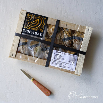 Fresh Dibba Bay oysters No2 grade, a pack of 10 premium shellfish served in their natural shells on ice, ready to enjoy