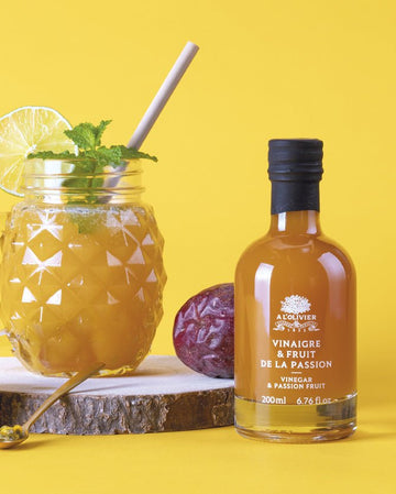 Passion fruit infused vinegar from L'Olivier in an elegant glass bottle, perfect for gourmet salad dressings