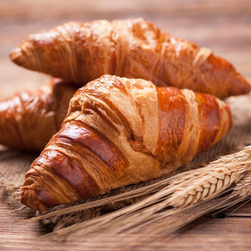 Pre-baked mini croissants made with pure butter, ready to serve in a box of 10 pieces, perfect for breakfast