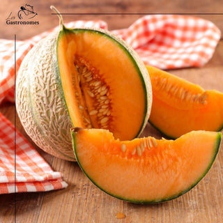 Fresh, juicy melon from Sicily showcasing its vibrant orange flesh and green skin, ready to enjoy as a refreshing summer treat