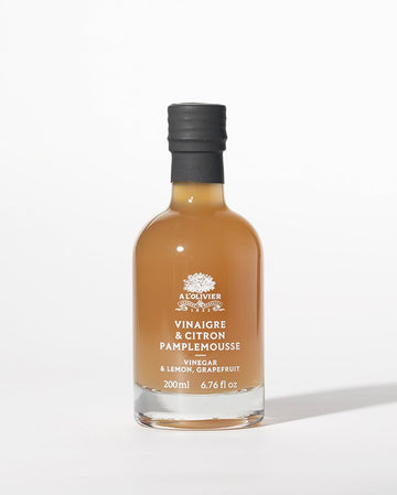 Bottle of refreshing vinegar and lemon grapefruit drink, ideal for detox, hydration and natural health benefits
